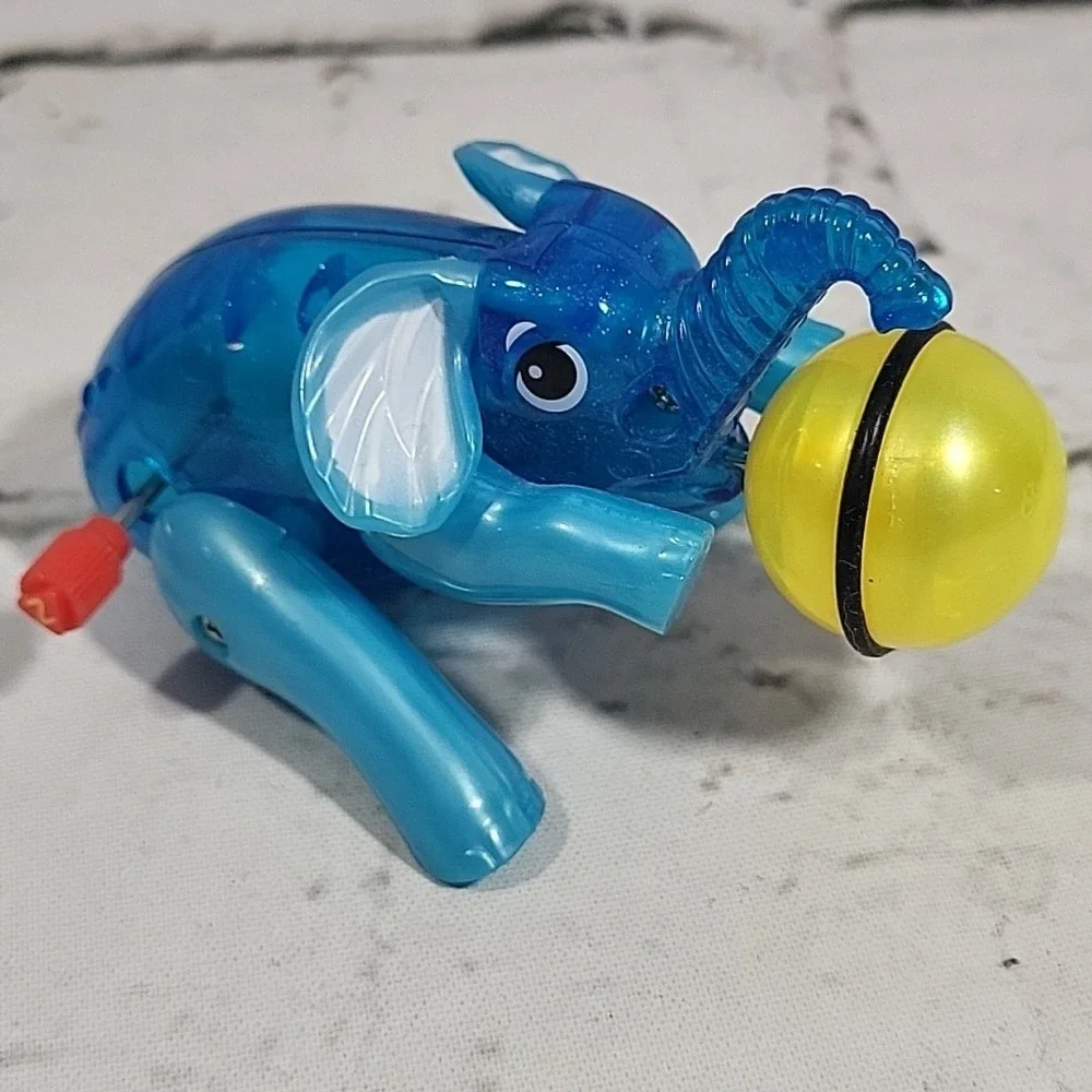 Circus Elephant‎ Wind-Up Toy Spinning Beach Ball Blue Plastic 2014 Tested Works